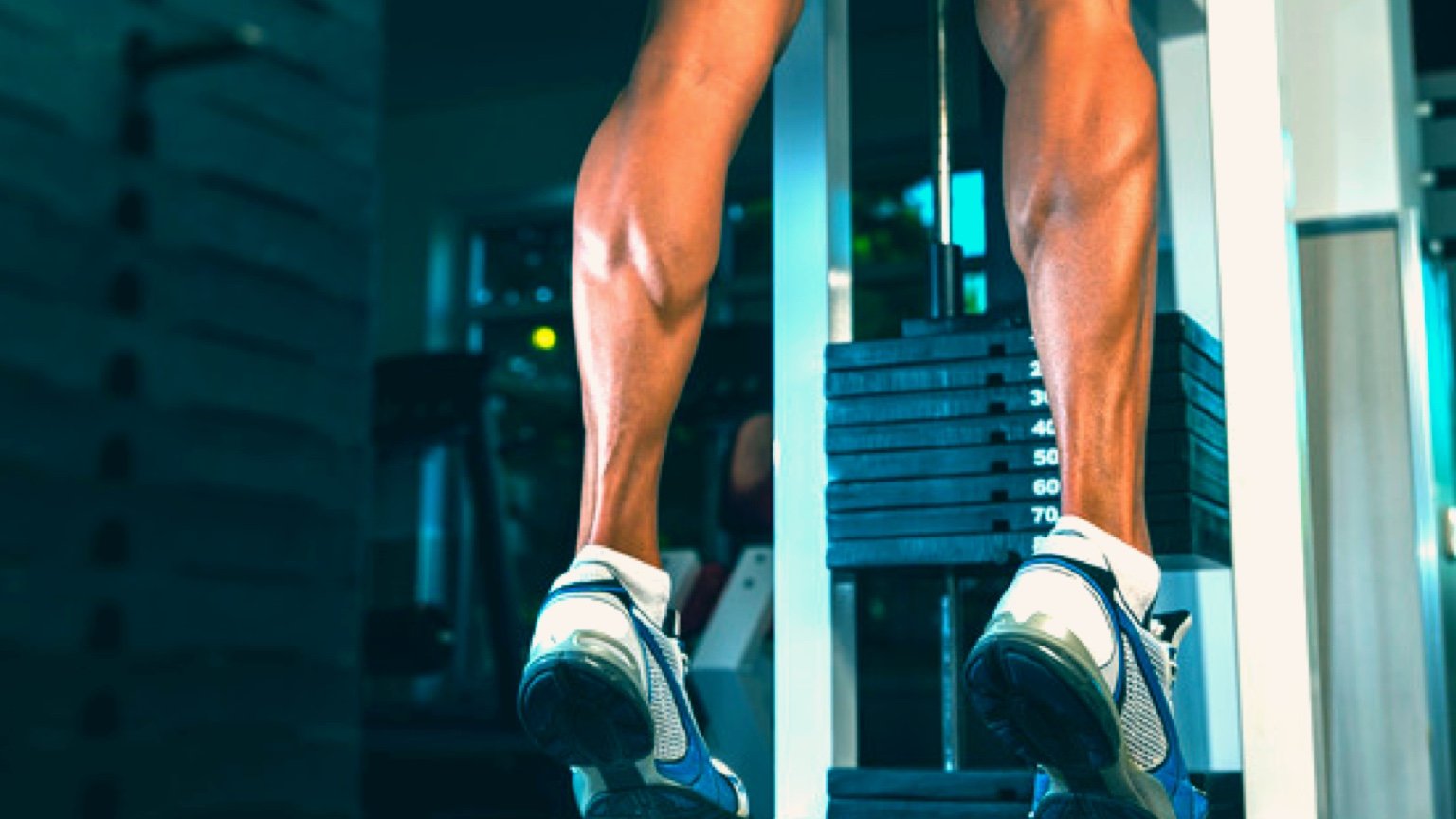 Man performs calf raises