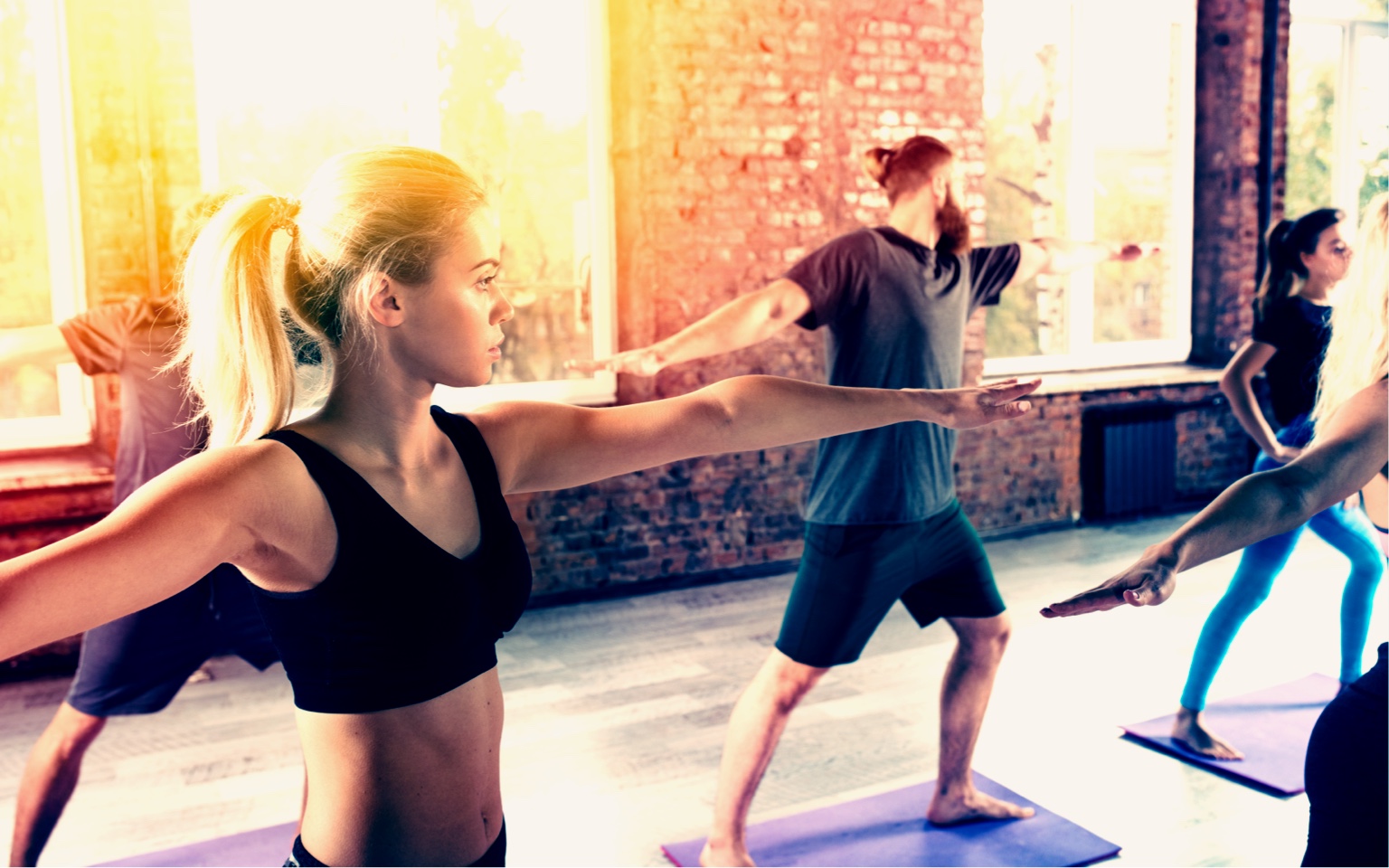 People taking part in a group fitness class