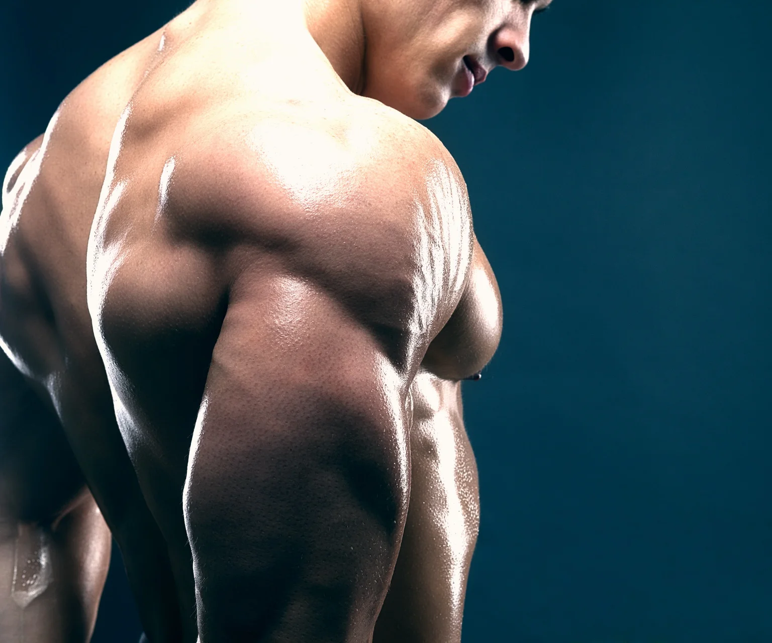 photo - Photo of a man with big lateral deltoid (shoulder) muscles