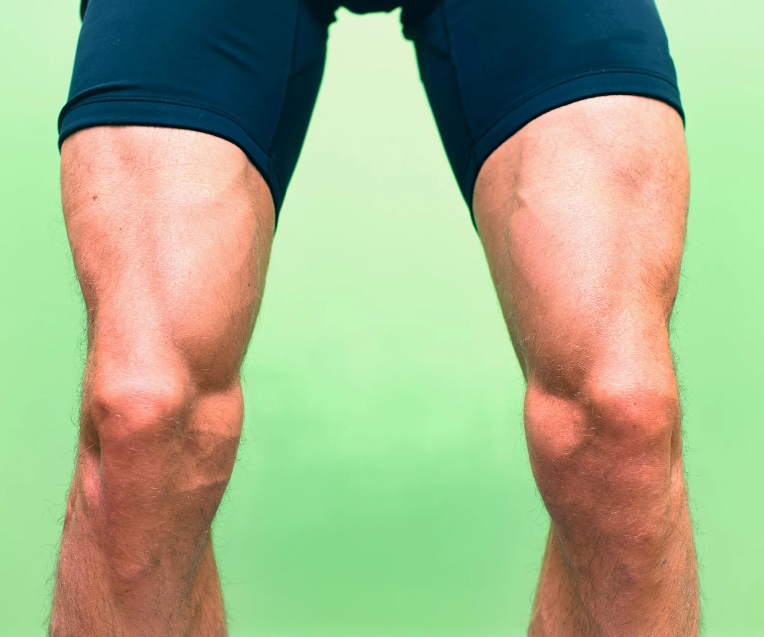 photo - Man's legs showing large developed quads muscles