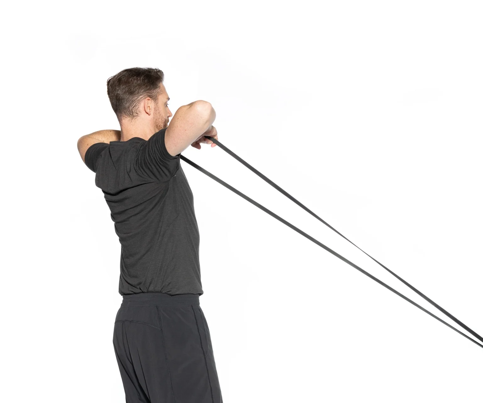 photo - Man performs a cable face pull