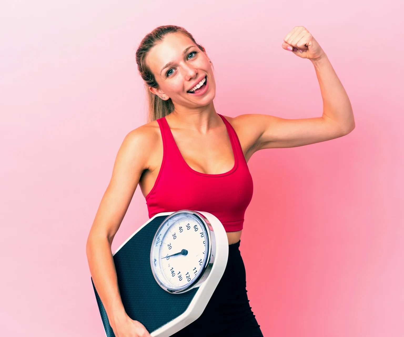 photo - Woman holds a weighing scale. Gym Geek AI can generate a weight loss plan for you.